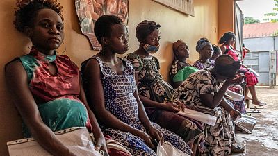 Pregnant women gathering for check up, Kampala, Uganda
