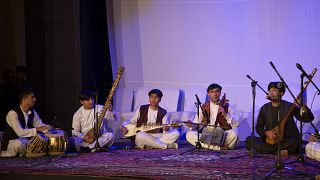 Afghanistan National Institute of Music performing at a refugee camp in Doha, Qatar