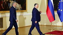 Prime Minister of Hungary Viktor Orban, right, walks in front of Prime Minister of Slovenia Janez Jansa in Ljubljana, Slovenia, Friday, July 9, 2021.