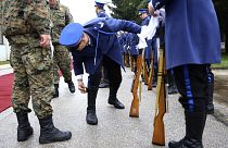 A member of the Bosnian Honour guard prepares before a ceremony in Rajlovac barracks near the capital Sarajevo, Bosnia, Friday, Dec. 10, 2021.