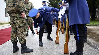 A member of the Bosnian Honour guard prepares before a ceremony in Rajlovac barracks near the capital Sarajevo, Bosnia, Friday, Dec. 10, 2021. 