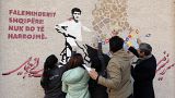 A group of Afghan artists evacuated after the Taliban takeover in their homeland painted a mural in the Albanian capital to show their gratitude to Albania