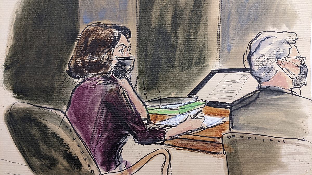 In this courtroom sketch, Ghislaine Maxwell, left, sits at the defence table while listening to testimony in her sex abuse trial, Thursday, Dec. 16, 2021, in New York.