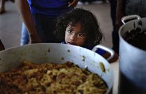 Ребенок в одном из центров приема мигрантов в Мехико