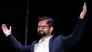 Chile's President elect Gabriel Boric, of the "I approve Dignity" coalition, celebrates his victory in the presidential run-off election  in Santiago, Chile, Dec. 19, 2021.