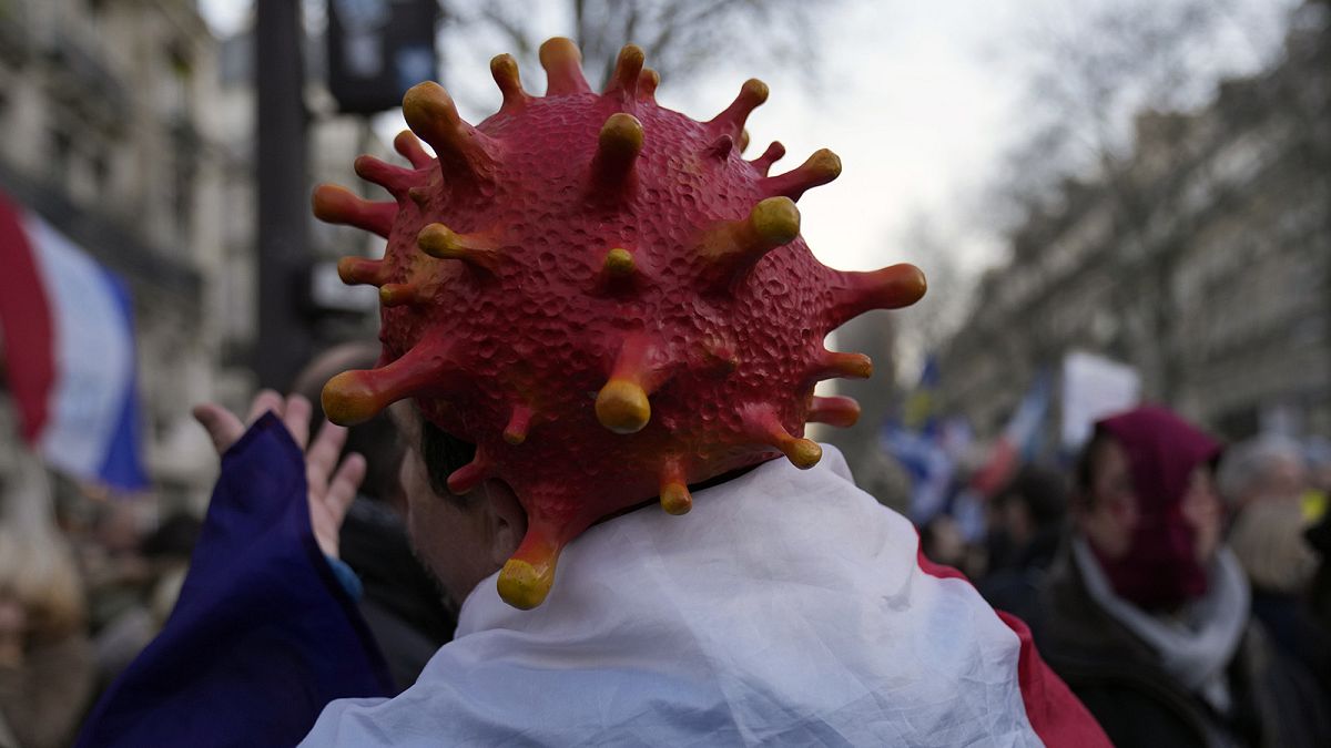 Demonstrators to voice opposition to the new vaccine pass, mandatory vaccine and ongoing government restrictions attend a protest demonstration in Paris