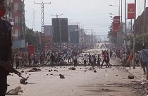 Demonstrators, blocked roads, debris in Goma DRC.