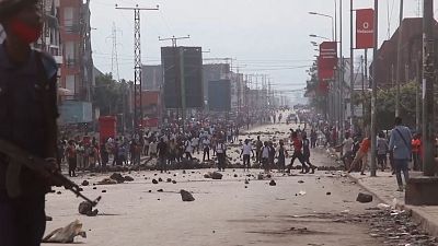 Demonstrators, blocked roads, debris in Goma DRC.