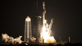 File-This NASA handout image shows a SpaceX Falcon 9 rocket launching with NASA's Imaging X-ray Polarimetry Explorer (IXPE) spacecraft, Dec 9, 2021. 