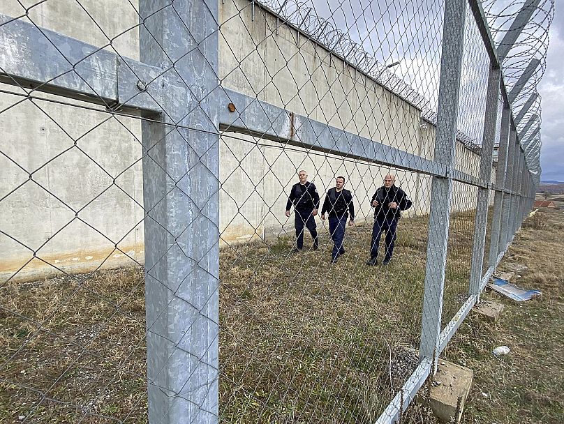 Kosovan prison guards inspect the facility at Gjilan where Denmark will run the new 300-cell facility, December 17, 2021