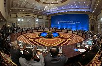 Syrian regime representatives and opposition delegates along with other attendees take part in the session of Syria peace talks in Astana on December 22, 2017.