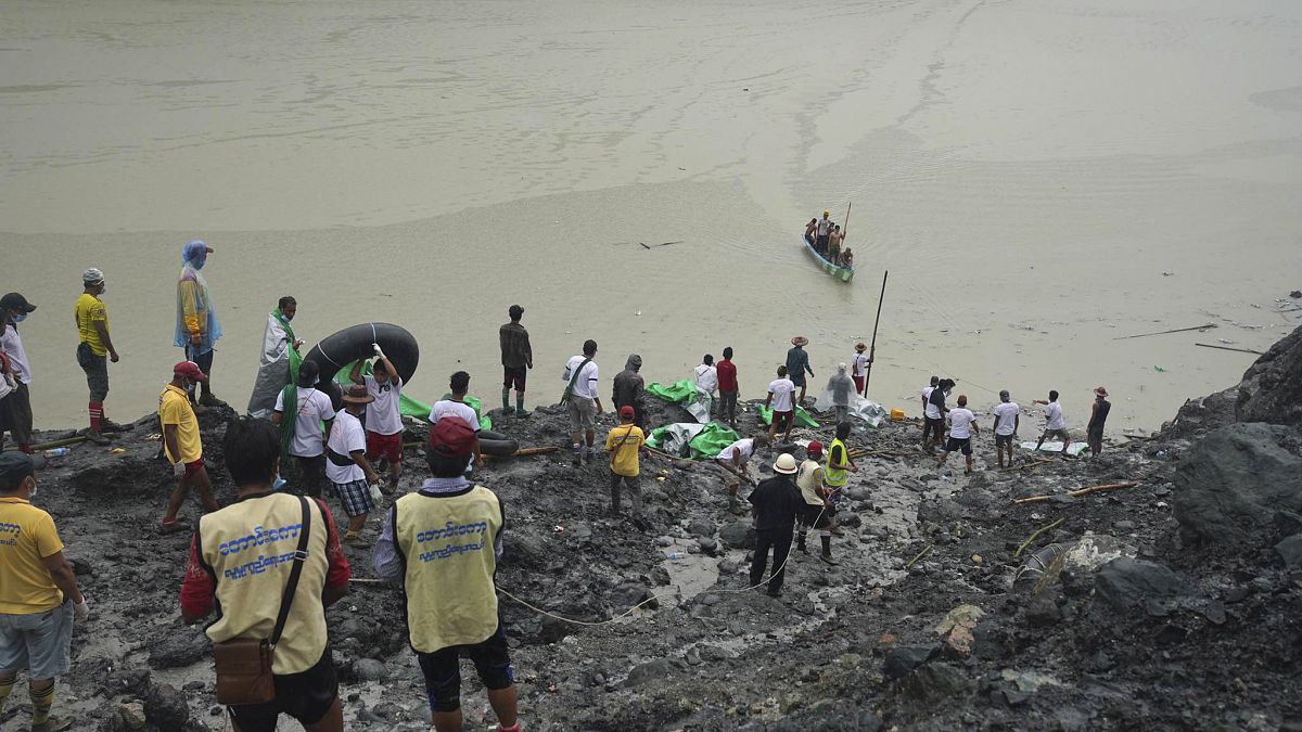 Rescuers recover bodies in Hpakant, Kachin State, Myanmar, on July 3, 2020, following a landslide at a jade mine.