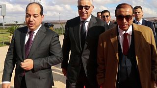 Libya's presidential candidates call for unity after poll postponement