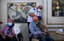In this Jan. 13, 2021 file photo, a man receives his second Pfizer-BioNTech COVID-19 vaccine at a private nursing home, in Ramat Gan, Israel.