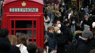 Shoppers do their last Christmas shopping in Covent Garden in London, Wednesday, 22 December 2021.
