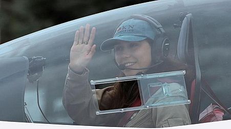 Flying solo, 19-year-old woman takes off on round-the-world record bid.