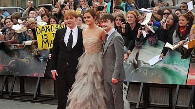 British actors (L-R) Rupert Grint, Emma Watson and Daniel Radcliffe attend the world premiere of Harry Potter and the Deathly Hallows - Part 2 in London on July 7, 2011.