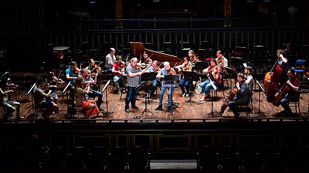 Musicians in the concert hall of Liszt Academy in Budapest on May 19, 2017 during their rehearsal for an evening concert with Hungarian 'Concerto Budapest' symphony orchestra.