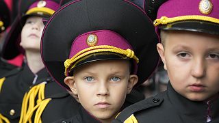 Young cadets attend a ceremony on the first day of school at a cadet lyceum in Kyiv, Ukraine