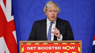 Britain's Prime Minister Boris Johnson speaks during a media briefing on COVID-19, in Downing Street, London, Wednesday Dec. 15, 2021.