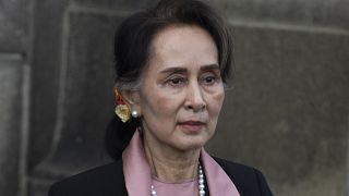Myanmar's leader Aung San Suu Kyi leaves the International Court of Justice after the first day of three days of hearings in The Hague, Netherlands on Dec. 10, 2019.