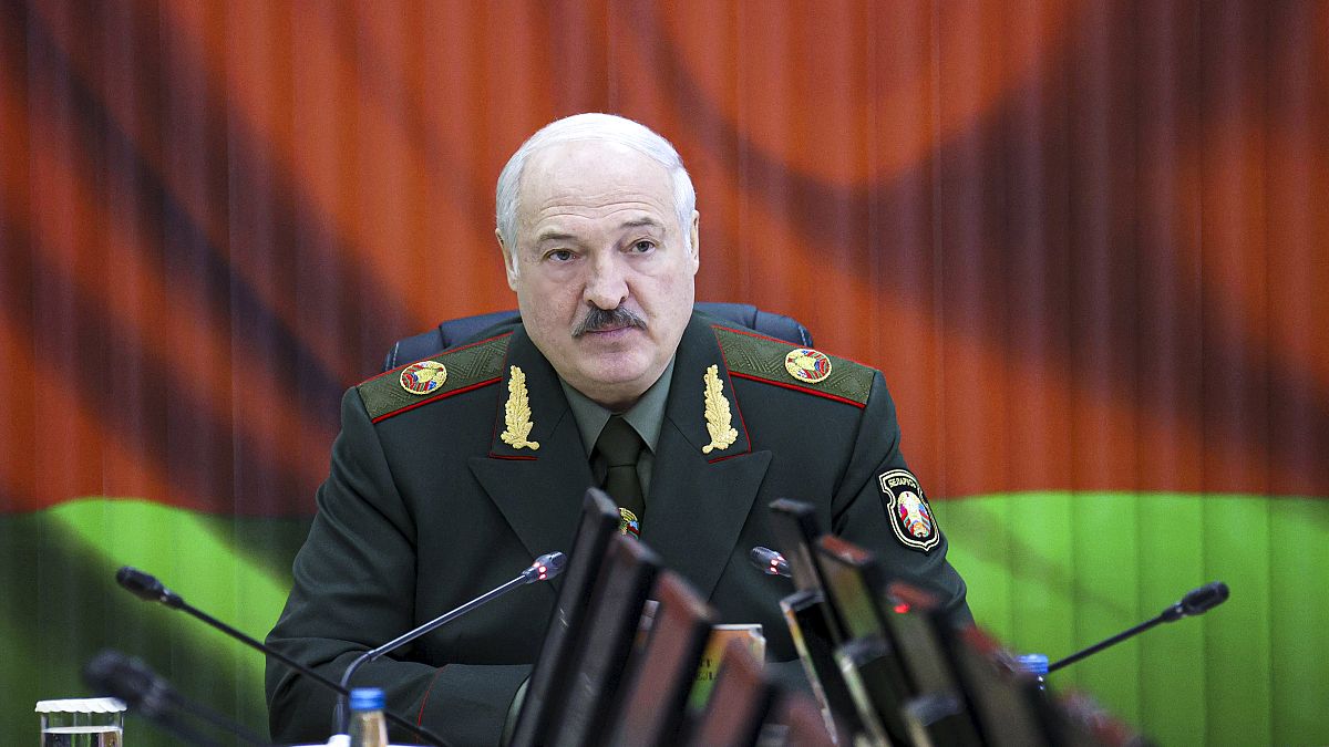 Belarusian President Alexander Lukashenko attends a meeting with top level military officials in Minsk, Belarus, Monday, Nov. 22, 2021.