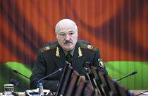 Belarusian President Alexander Lukashenko attends a meeting with top level military officials in Minsk, Belarus, Monday, Nov. 22, 2021.