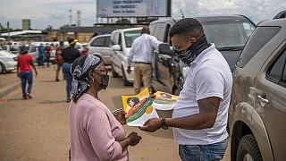 South-African funeral workers promote vaccination