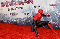 In this file photo taken on December 13, 2021, a fan in cosplay is seen at Sony Pictures' "Spider-Man: No Way Home" Premiere in Los Angeles, California.