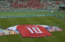 Denmark fans and players show their support for Christian Eriksen following his cardiac arrest at Euro 2020