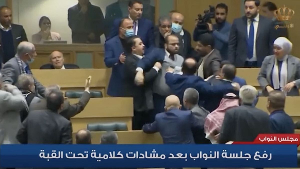 Jordan MPs brawl on the floor of the parliament. 