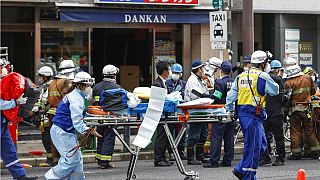 Спасательная операция на месте пожара в клинике в Осаке. 17 декабря 2021 г. 