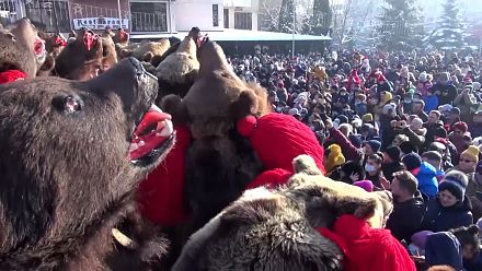 Romanians dressed as bears try to ward off evil