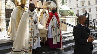 Pallbearers carry the casket holding the body of Archbishop Desmond Tutu after the funeral service in St. George's Cathedral in Cape Town, South Africa, Jan. 1, 2022