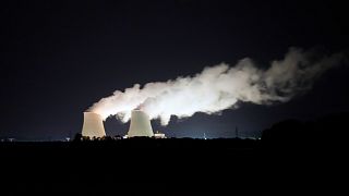 Steam escapes at night from the nuclear plant of Nogent-sur-Seine, 110 kms (63 miles) south east of Paris, Aug. 8, 2021.