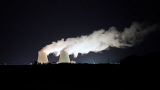 Steam escapes at night from the nuclear plant of Nogent-sur-Seine, 110 kms (63 miles) south east of Paris, Aug. 8, 2021. 