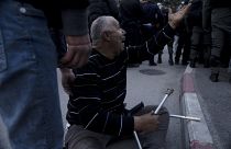 Участник акции протеста против снова домов палестинцев