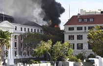 A fire burns at the Houses of Parliament, in Cape Town, South Africa, Jan. 2, 2022. 