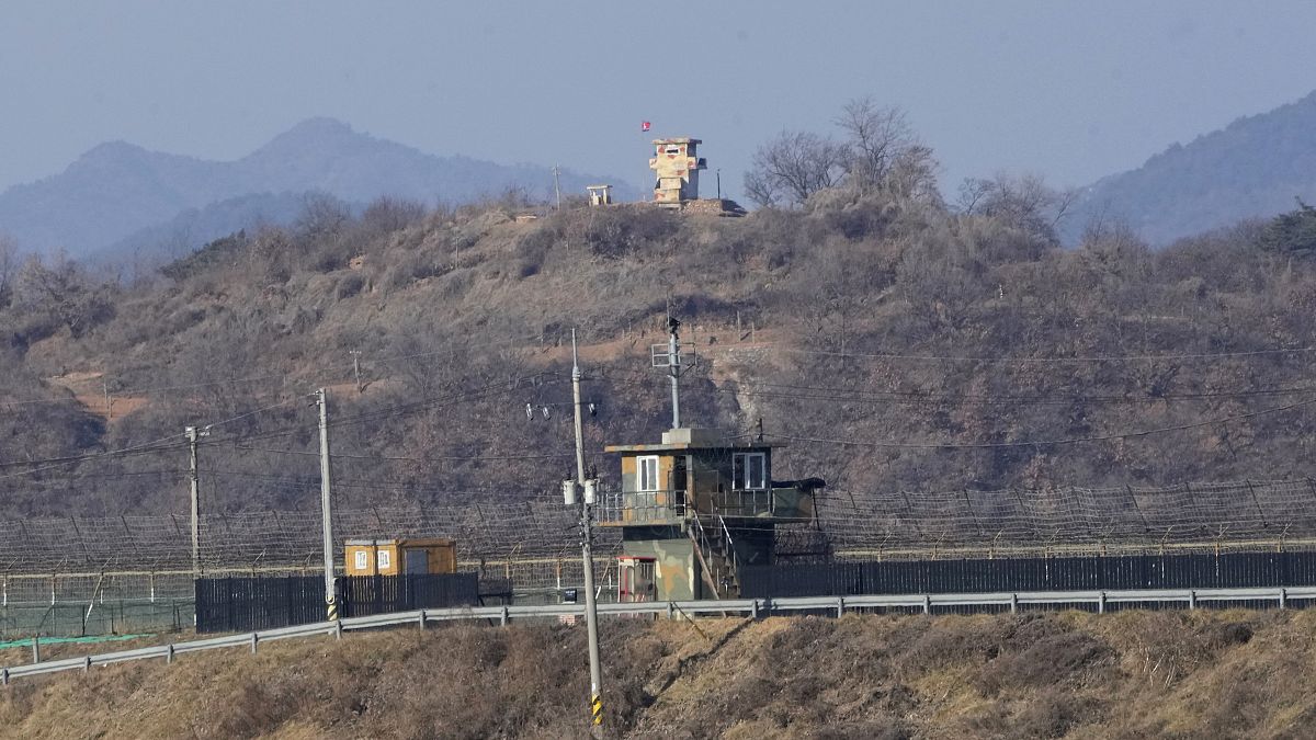 Military guard posts of North Korea, rear, and South Korea, front, are seen in Paju, near the border with North Korea, South Korea, Jan. 2, 2022.
