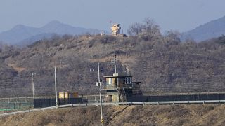 Military guard posts of North Korea, rear, and South Korea, front, are seen in Paju, near the border with North Korea, South Korea, Jan. 2, 2022.