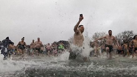 Swimming group holds annual New Year's day plunge in Boston