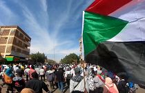 Sudanese demonstrators taking to the streets in the capital Khartoum to protest against military rule.