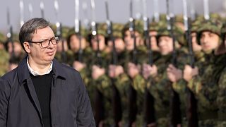 Serbia's President Aleksandar Vučić reviews the honour guard during a welcoming ceremony at the army barracks near Belgrade