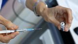 A medic prepares a dose of the Pfizer-BioNTech COVID-19 coronavirus vaccine at Ichilov Tel Aviv Sourasky Medical Centre in Israel's Mediterranean coastal city of Tel Avi