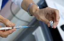 A medic prepares a dose of the Pfizer-BioNTech COVID-19 coronavirus vaccine at Ichilov Tel Aviv Sourasky Medical Centre in Israel's Mediterranean coastal city of Tel Avi