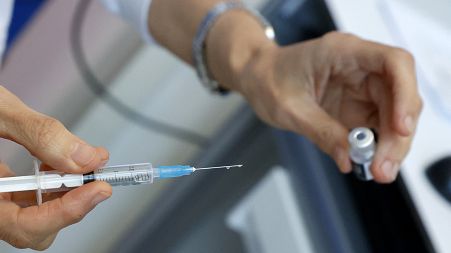 A medic prepares a dose of the Pfizer-BioNTech COVID-19 coronavirus vaccine at Ichilov Tel Aviv Sourasky Medical Centre in Israel's Mediterranean coastal city of Tel Avi