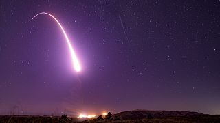 This image taken with a slow shutter speed on Oct. 2, 2019, and provided by the US Air Force shows an unarmed Minuteman 3 intercontinental ballistic missile test launch.