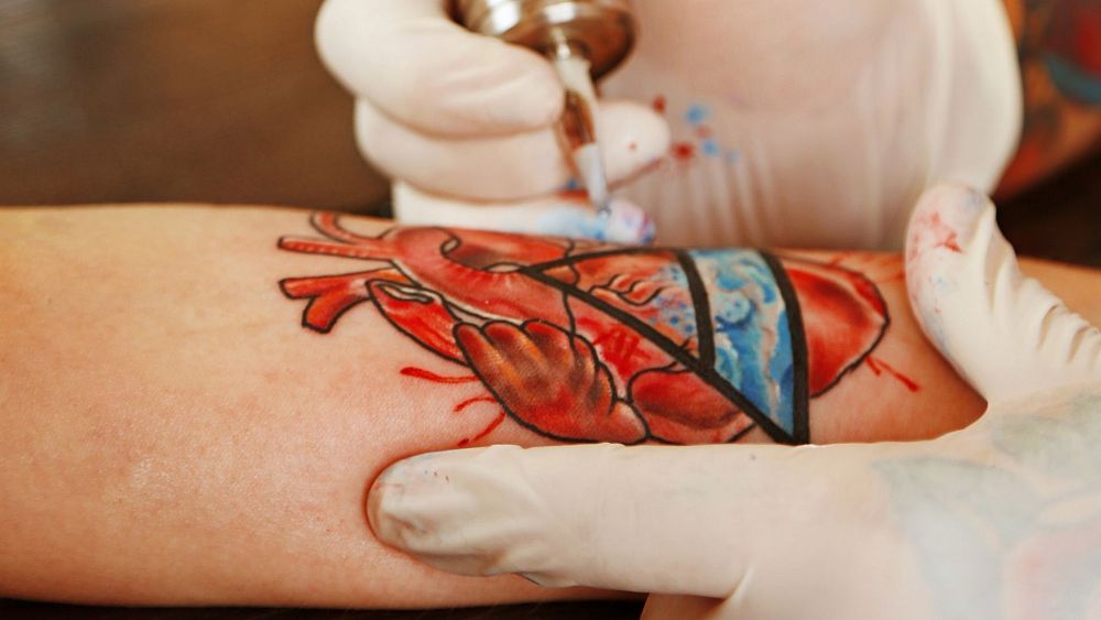 EU ban on colored ink for tattoos makes artists see red  CGTN