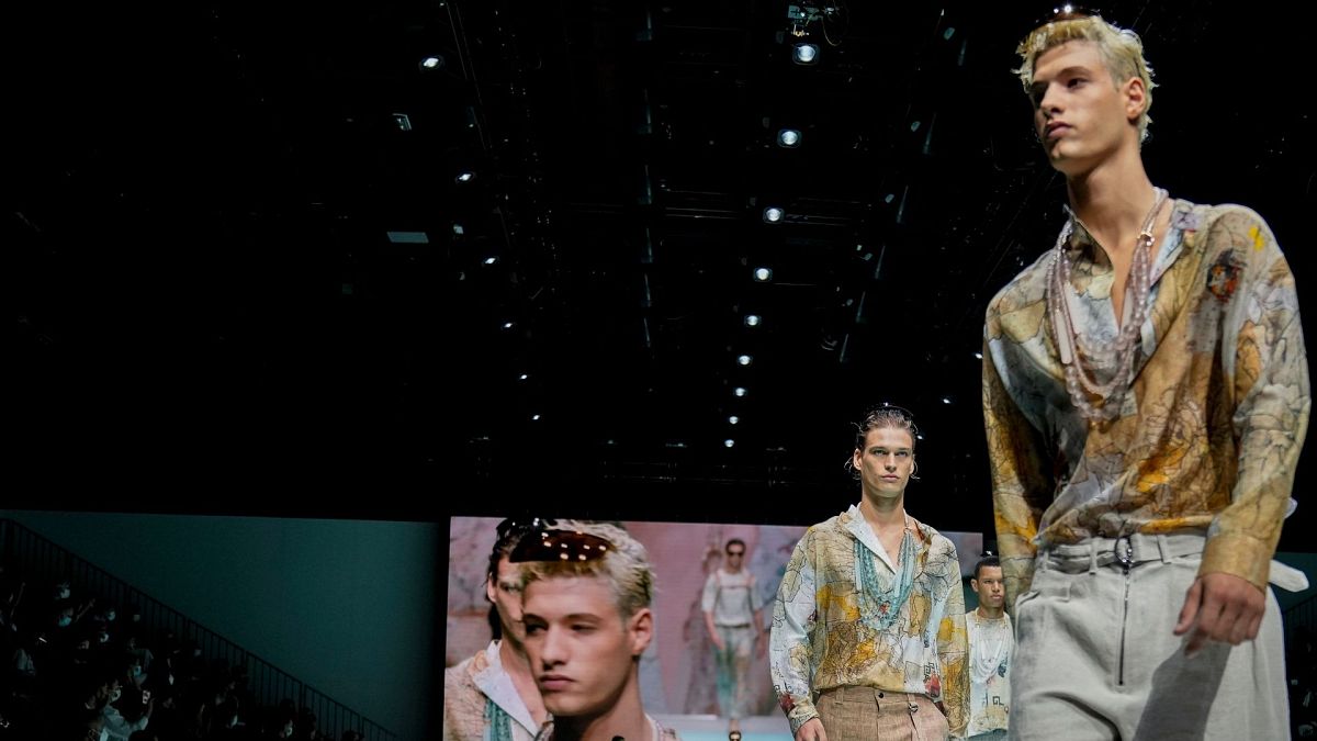 Models wear creations for the Emporio Armani Spring/Summer 2022 collection during Milan Fashion Week