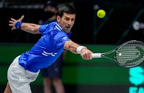 Novak Djokovic, pictured during a match in Austria in November, was due to defend his title at the Australian Open this month.